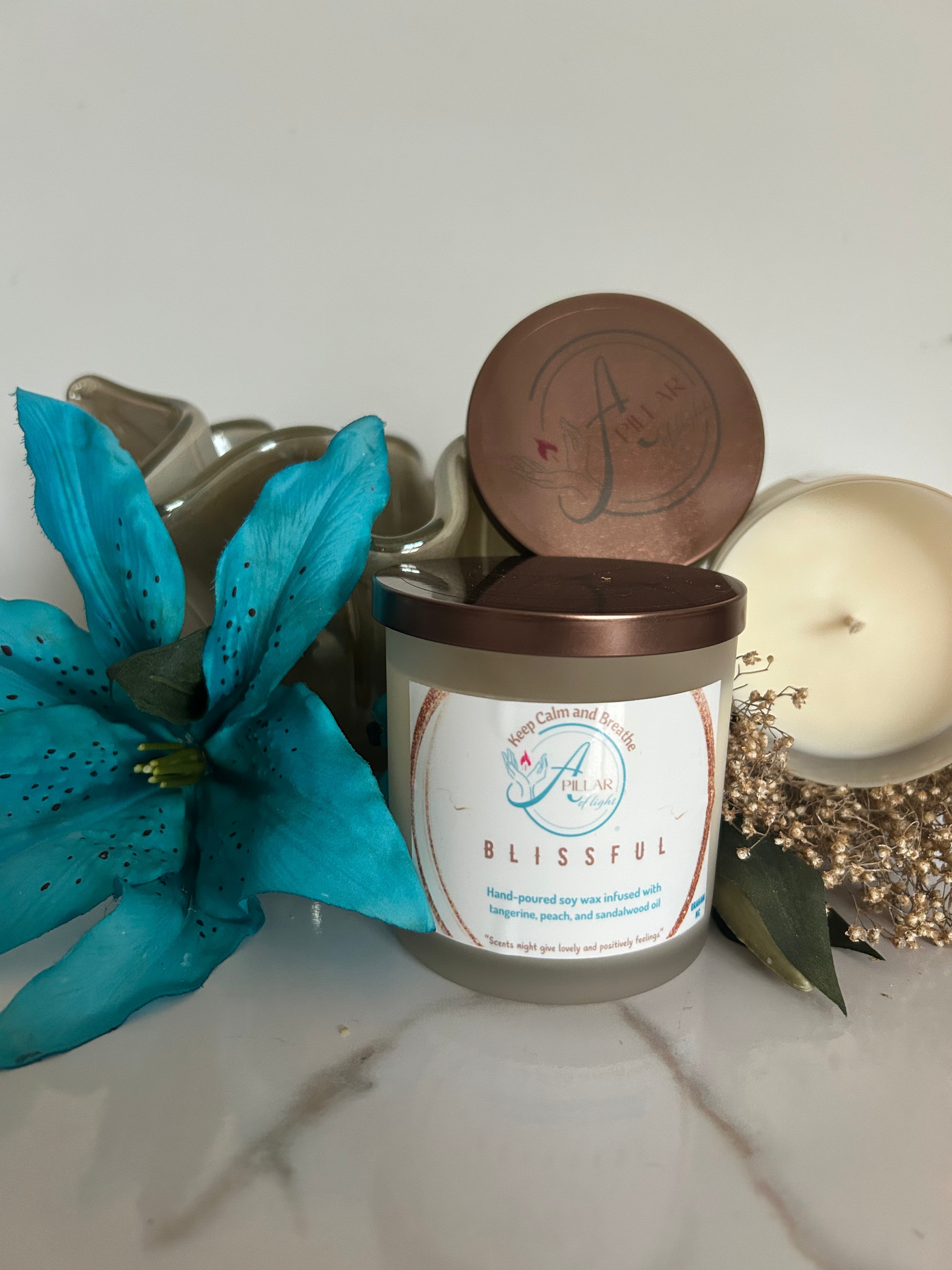 "Blissful Collection — hand-poured peach and sandalwood aromatherapy candles, wax melts, and room sprays by A Pillar of Light"
