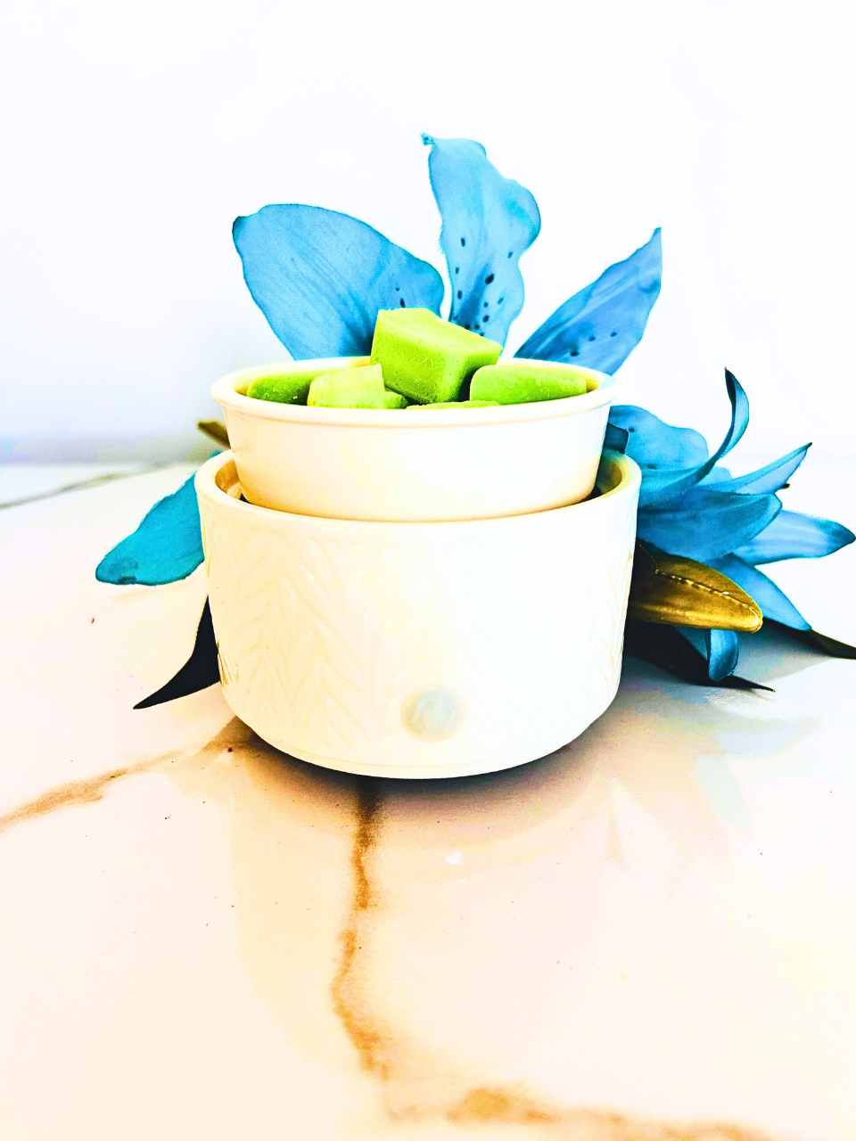 "White ceramic wax melt warmer with willow leaf pattern design on warming dish"
